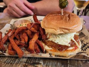 Nashville burger and sweet potato fries at Mad Mad Vegan - Barcelona in Barcelona