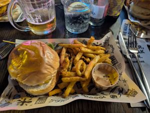 "chicken" burger with Cajun fries 🍟 at Mad Mad Vegan - Barcelona in Barcelona