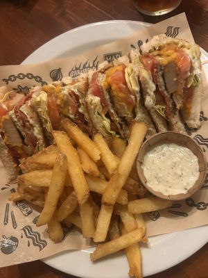 The Mad Chicken Sandwich with classic fries  at Mad Mad Vegan - Barcelona in Barcelona