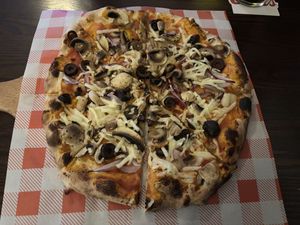 Vegan pizza with mushrooms, onion, olives and vegan cheese.  at Sextons Bar in Limerick