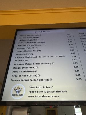 Menu board with the vegan options shown at bottom. They were out of the Jamaica one and I didn’t try the cactus!   at Tacos A La Madre in College Park