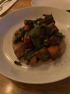 Sweet potato bravas with pickled lime and mint at Little Wolf Restaurant in Edmonton
