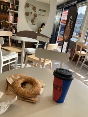 Vegan latte and vegan Thesoloniki bagel  at Coffee Island in Athens