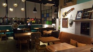 Restaurant interior, with random Americana on the walls. at Green Vege Cafe in Shanghai