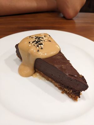 Chocolate carob caramel cake  at UMAMI Plantbased in Barcelona