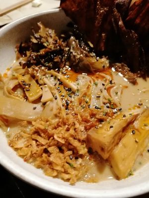 Close-up creamy mushroom ramen at UMAMI Plantbased in Barcelona