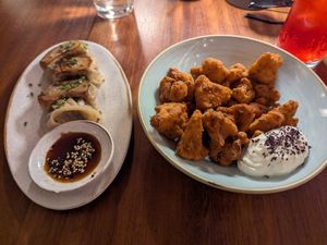 Gyoza and crispy cauliflower at UMAMI Plantbased in Barcelona