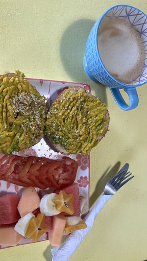 Avocado toast and oat latte.  at Josie's  in Utila