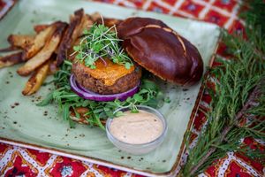Classic Burger featuring a house-made patty created with Beyond Meat, topped with a chipotle cashew gouda at Great Sage in Clarksville