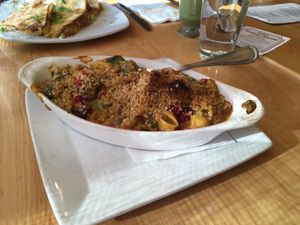 Weekend mac n cheese special with four types of house made cheese, cranberries, and spinach. at Great Sage in Clarksville