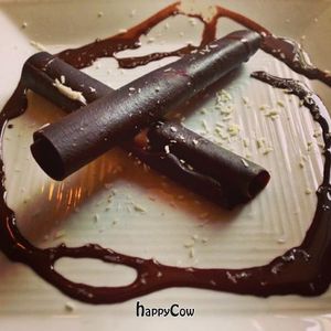 Raw chocolate crepes with a coconut creme. at Great Sage in Clarksville