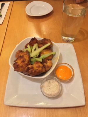 Buffalo Cauliflower Bites - Deep-fried Battered Cauliflower with Vegan Buffalo Sauce and Vegan Ranch  at Great Sage in Clarksville