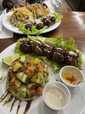 Falafel, tomato, onion, cucumber and radish salad  at Al Chaer in Sao Paulo
