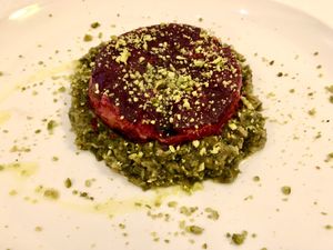 Beetroot flower on a bed of leeks  at Il Lughino in Milan