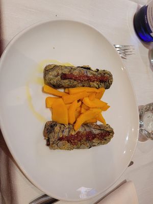 Cabbage role with black legume filling - amazing! at Il Lughino in Milan