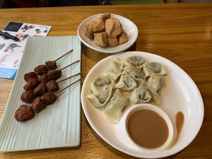 Jiaozi with sesame sauce, spongy tofu, lion’s mane skewers (we had eaten some at this point)  at Huì Yuán Sù Shí Fāng 慧缘素食坊 Lotus Vegan in Shanghai