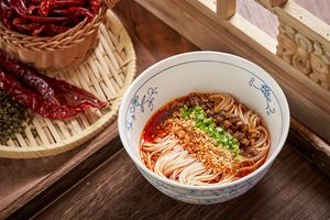 Dan Dan Noodles

Made with authentic Szechuan spicy peppers served with bouncy noodles. It is served without a hot broth, so it makes for an ultimate summer treat.  at Huì Yuán Sù Shí Fāng 慧缘素食坊 Lotus Vegan in Shanghai