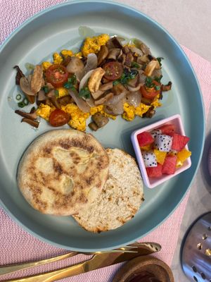 personal favourite - veggie scrambled tofu eggs with toasted english muffins and fruit salad at Aubrie's Plant-Based Cuisine in El Nido