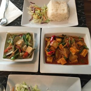 Green curry with tofu and chili & basil fried in red curry with tofu. at Tuk Tuk in Helsinki