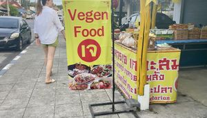 Sign outside let’s you know when you’ve arrived  at Thai Food Vegetarian or Vegan - Maybe closed in Surat Thani