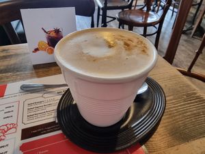 Oatmilk latte at à table!  in Budapest