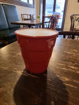 Decaf oatmilk latte at à table!  in Budapest