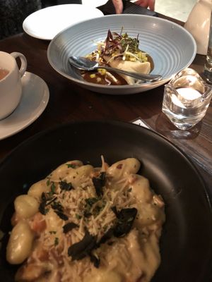 Handmade tamales with pumpkin mole and gnocchi with roasted butternut squash .  at Tree House in St Louis