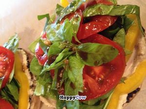 Stuffed Portabella Mushroom Towers. 
Marinated Caps layered high with Pesto, Tomatoes, Onion, Spinach, Peppers, Grated Carrot, Cashew cheeze and topped with Sprouts. 
Still think veggies are only a side dish?  at Healthy Funky Foods in Calgary
