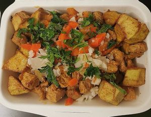 Soja à Portuguesa. Soy and potatoes in a delicious sauce, topped up with pickles and herbs  at Verde Aos Pedaços in Corroios