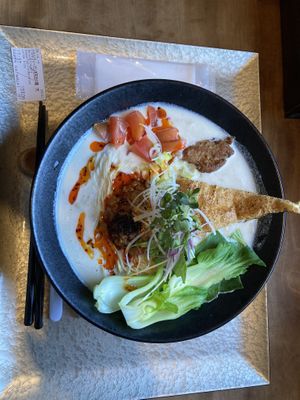 large bowl of creamy soy milk ramen  at Ramen Katamuki in Kyoto