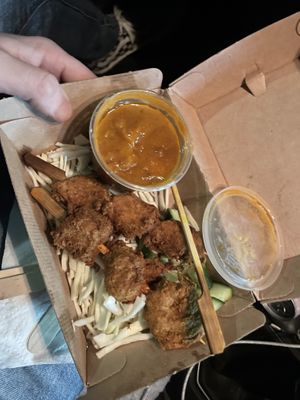 Satay chicken skewers  at WOK2VEGAN in Birmingham