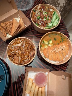 Spring rolls, sesame crunch toast, chicken katsu, crispy duck chow mein and chicken chow mein at WOK2VEGAN in Birmingham