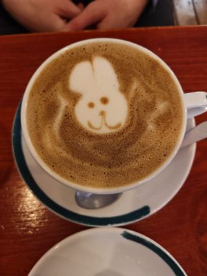 Dirty chai latte with cute easter themed latte art at Apricot Coffee in Budapest