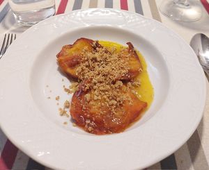 Grilled peach for dessert at Restaurante SUHAZI Jatetxea in San Sebastian