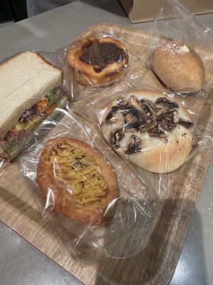 Five of my six items.   Favorite was definitely the soy cream bread.   I love that they had a non fried more bread like option.   I truly loved it all!   at Earth Bakery in Yokohama