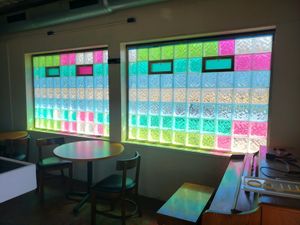 Colorful glass windows at Shroomlicious Meals in Memphis