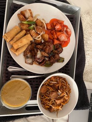 Full plate with curry sauce on side  at Happy Valley in Rochester