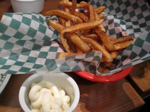 Fries with vegan mayo and ketchup at Vegan Rapide - Sherbrooke in Montreal