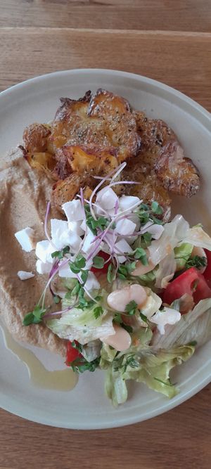 Smashed potatoes,  white bean salad 🥗 😋 at VegÁno in Liptovsky Hradok