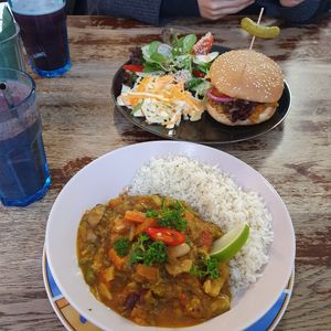 Vegetable sabji and vegan burger at Vieta in Vilnius
