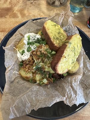 Mushrooms and new potatoes with garlic bread.  at Vieta in Vilnius