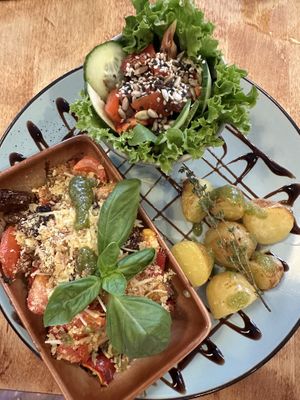 Smoked tofu with new potatoes and salad.  at Vieta in Vilnius
