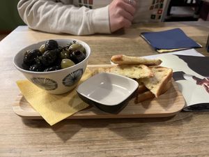 Marinated olives with garlic bread  at Vieta in Vilnius