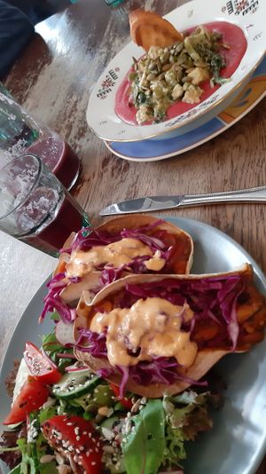 tacos and mashed potatoes in the background at Vieta in Vilnius