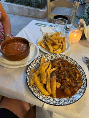 Moussaka, Mushroom Stifado and hand cut chips.  Absolutely Delicious.  Will definitely eat here again. Great hot vegan food !! at Ta Kaloudia in Corfu