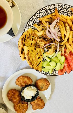 Mushroom gyros and tomato fritters 💚❤️  at Ta Kaloudia in Corfu