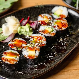 Roll with creamy avocado and secret sauce at Vilai Vegan House in Hamburg