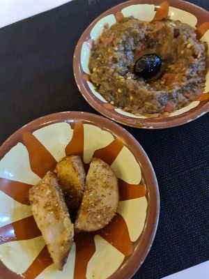 Free wedges and baba ganoush when you sit down! Delish (baba ganoush needed salt, which was available) at Taha The Grandson in Agadir