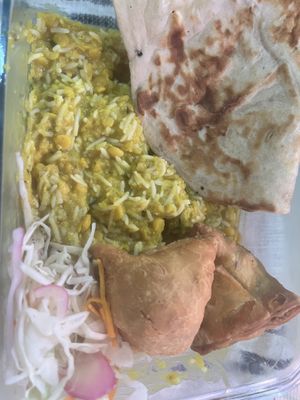 Takeout vegan naan, samosas, and Dal Tadka curry  at Noor Kitchen & Cocktails in Greensboro