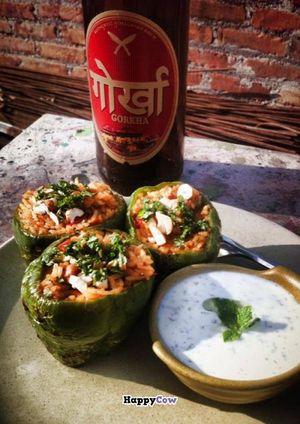 Turkish Biber Dolmasi with a cold Gorkha beer in the sun. at Places Restaurant and Bar in Kathmandu